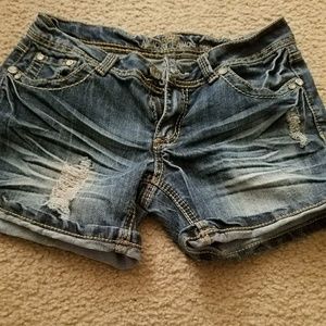Distressed denim shorts